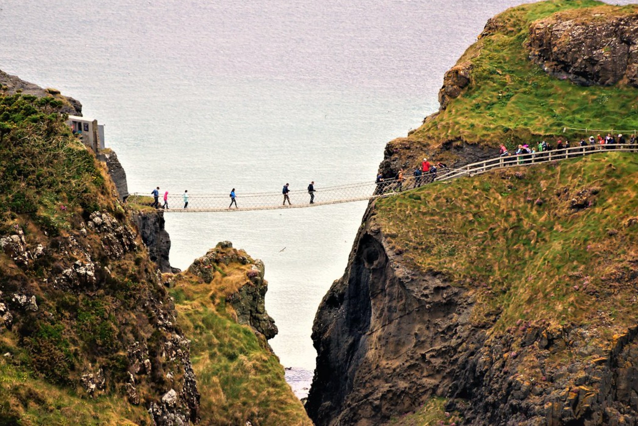 a precious rope bridge extending from one cliff to another